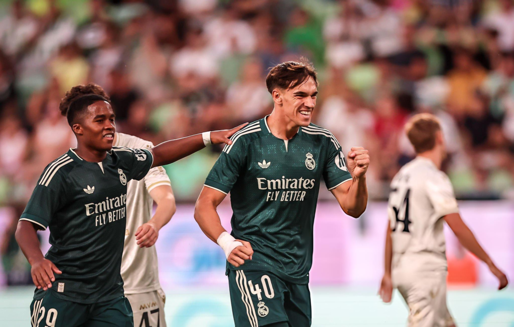 Carlos Espi of Real Madrid celebrates scoring the 0-2 goal during the match between Ferencvarosi TC and Real Madrid